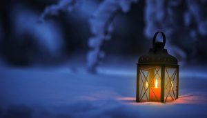 Candle lantern in snow